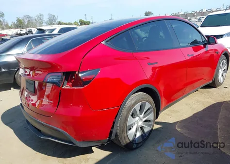 2022 Tesla Model Y Long Range Dual Motor All-Wheel Drive z USA, uszkodzony, nr VIN 7SAYGDEE9NF374421